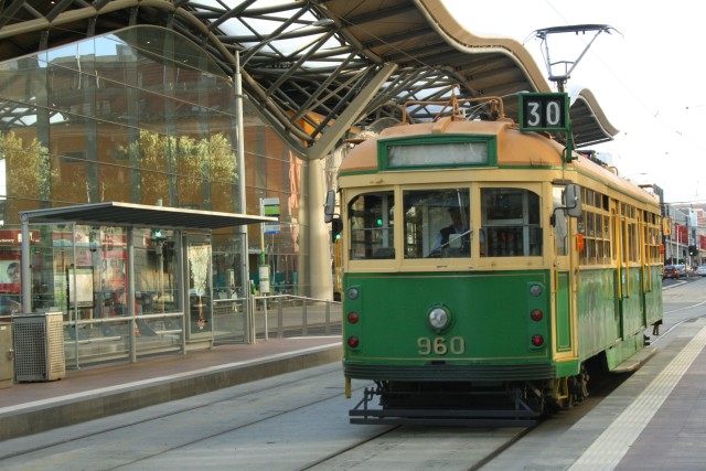 Tram with Spencer St Railway Station in the background.